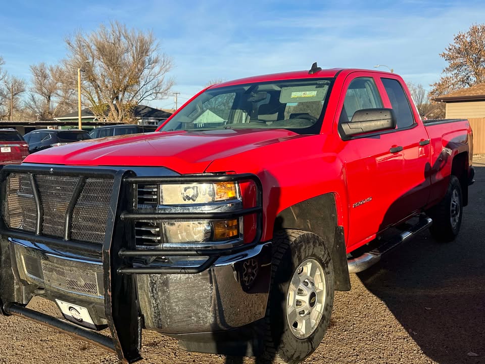 2016 Chevrolet Silverado 2500 HD Work Truck in Red Hot — front three-quarter view