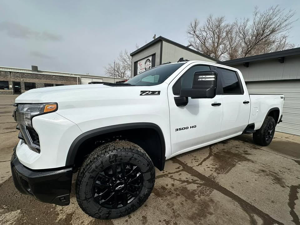 2026 Chevrolet Silverado 3500 HD LT in Summit White — front three-quarter view