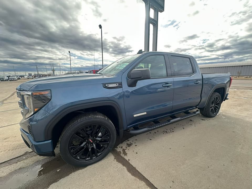 2026 GMC Sierra 1500 Elevation in Downpour Metallic — front three-quarter view